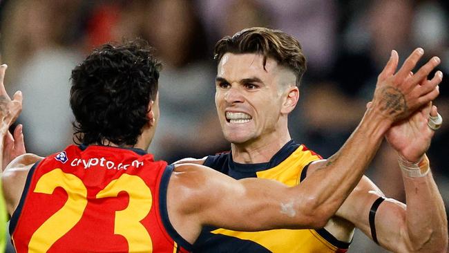 MELBOURNE, AUSTRALIA - APRIL 13: Ben Keays of the Crows celebrates a goal during the 2024 AFL Round 05 match between the Carlton Blues and the Adelaide Crows at Marvel Stadium on April 13, 2024 in Melbourne, Australia. (Photo by Dylan Burns/AFL Photos via Getty Images)