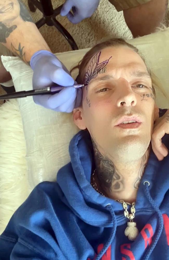 Carter shared video of him receiving one of his new tattoos. Picture: Instagram