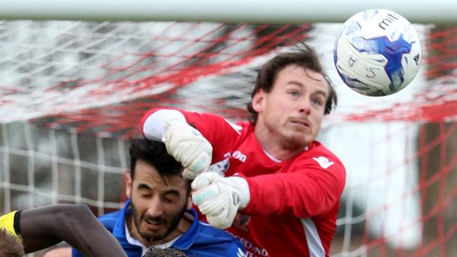 Avondale FC goalkeeper Chris Oldfield punches a corner clear during the NPL season. Picture: Mark Wilson.