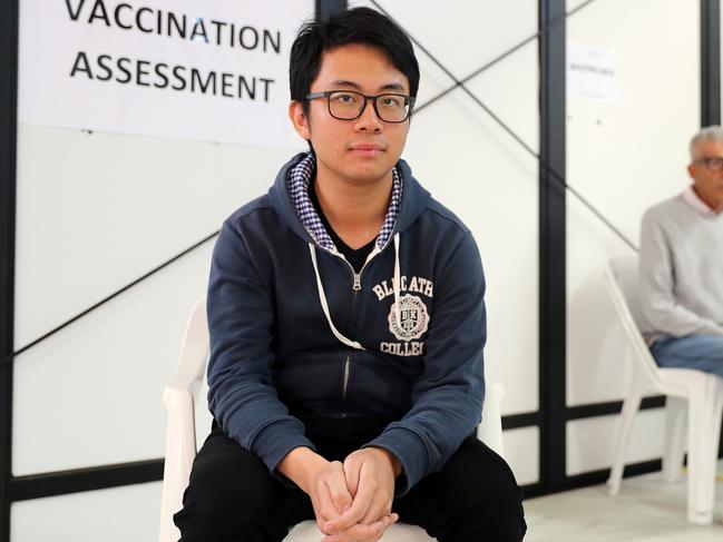 Ken Ng, 26, had the AstraZeneca vaccine on Friday, despite the warnings for people aged under 50. Picture: Tim Hunter