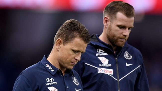 Dejected Blues coach Brendon Bolton with injured co-captain Sam Docherty after a loss. Picture: AAP Image/Joe Castro.