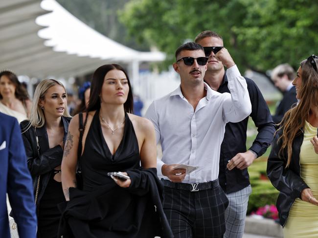 Racegoers rush to the course. Picture: Sam Ruttyn