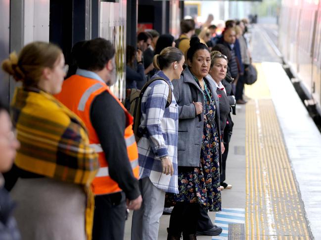 50c fares started today, people are waiting on the platform, Queensland Rail, Beenleigh Station, Monday 5th August - Photo Steve Pohlner