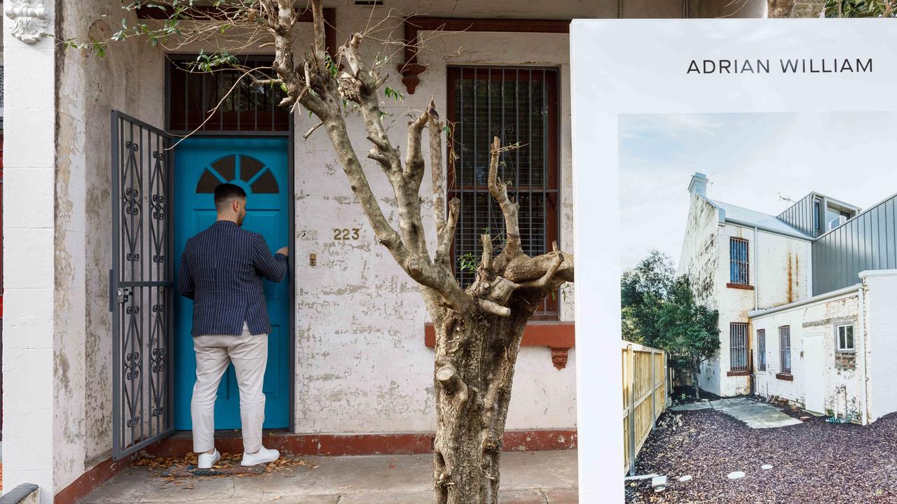 Joseph Lombardo, from agency Adrian William, unlocking a house up for inspection. Picture: Max Mason-Hubers