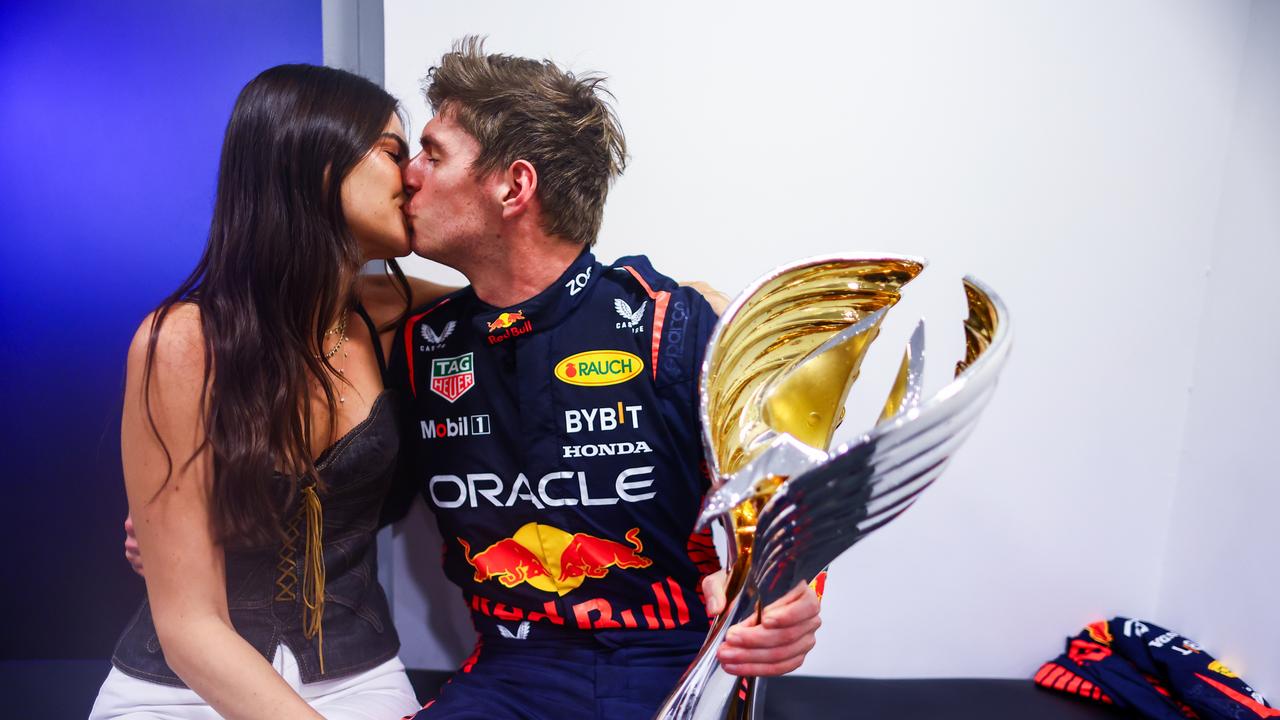 Race winner Max Verstappen of the Netherlands and Oracle Red Bull Racing and Kelly Piquet pose for a photo. (Photo by Mark Thompson/Getty Images)