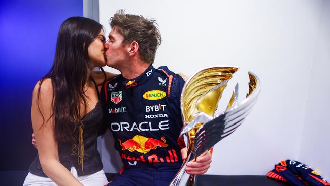 Race winner Max Verstappen of the Netherlands and Oracle Red Bull Racing and Kelly Piquet pose for a photo. (Photo by Mark Thompson/Getty Images)