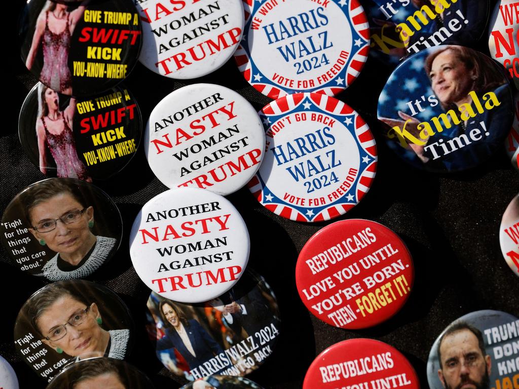 Campaign badges are sold in Michigan ahead of a campaign stop by Kamala Harris and Michelle Obama. Picture: AFP