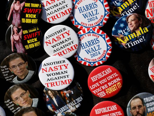 Campaign badges are sold in Michigan ahead of a campaign stop by Kamala Harris and Michelle Obama. Picture: AFP