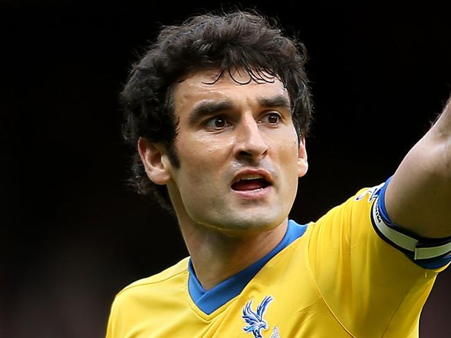 Crystal Palace's Mile Jedinak celebrates scoring his side's only goal during their English Premier League soccer match against West Ham at Upton Park, London, Saturday, April 19, 2014. (AP Photo/Stephen Pond, PA Wire) UNITED KINGDOM OUT - NO SALES - NO ARCHIVES