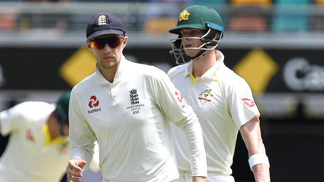 England captain Joe Root (left) and Australian captain Steve Smith are engaged in a tense battle.