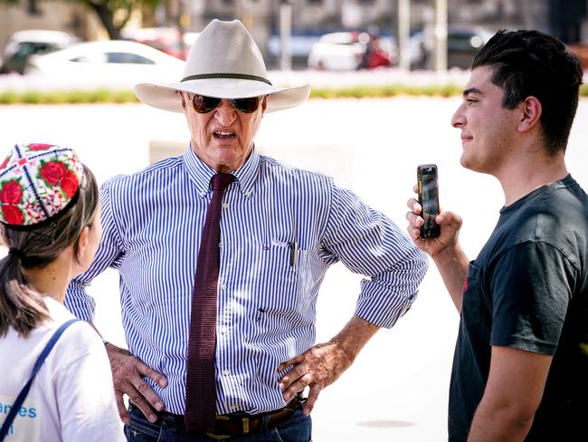 Drew Pavlou (right) with Bob Katter at a Uighurs rally