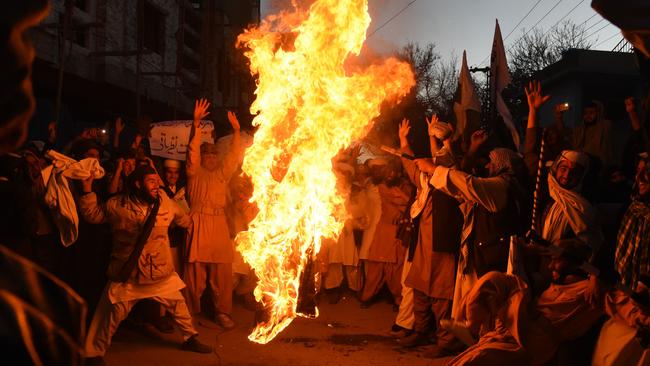 Pakistanis burn the US flag in Quetta on Thursday. Picture: AFP