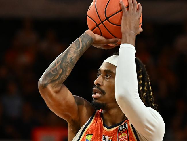 CAIRNS, AUSTRALIA - JANUARY 21:  Tahjere McCall  of the Taipans shoots during the round 16 NBL match between Cairns Taipans and Brisbane Bullets at Cairns Convention Centre, on January 21, 2024, in Cairns, Australia. (Photo by Emily Barker/Getty Images)