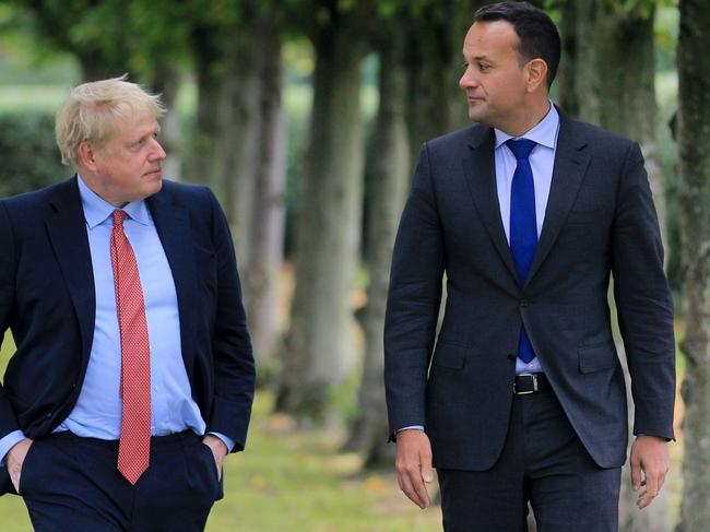 Ireland's Prime Minister, Leo Varadkar (L) and Britain's Prime Minister Boris Johnson (R) pose for a photograph at Thornton Manor Hotel. Picture: AFP