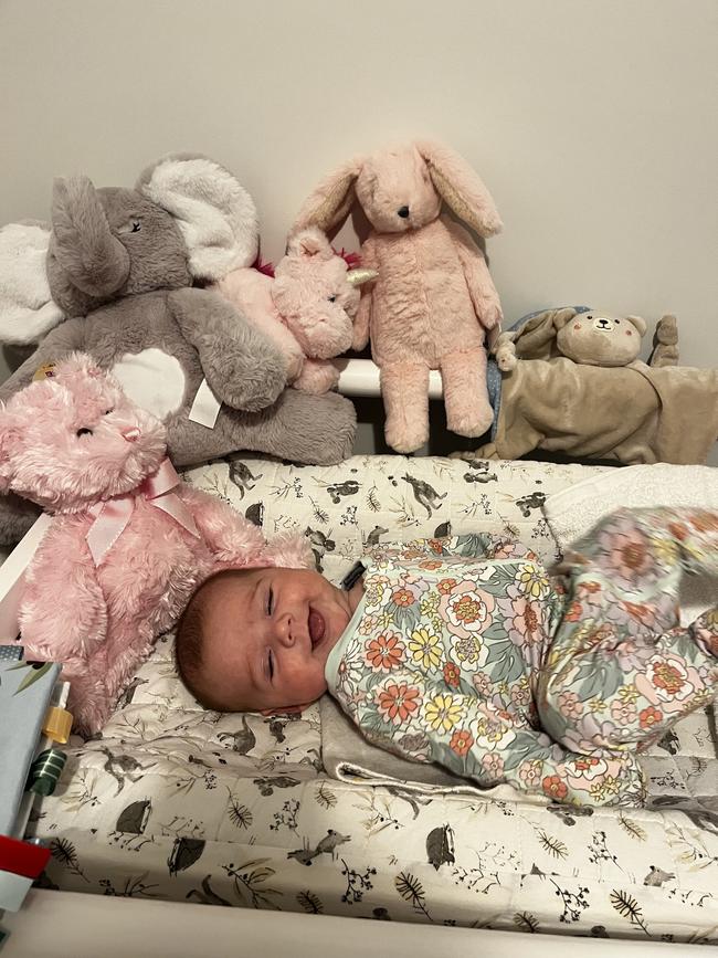 Charlie Arlow. 10 weeks. She loves tummy time, looking at books and smiling.