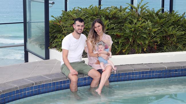 Jason and Vanessa Papillo with 3-month old baby Ivy enjoying their Easter break by the pool at Wave Broadbeach. Picture: Richard Gosling