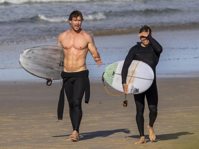 Hemsworth enjoyed a surf session with long-time mate and personal trainer Luke Zocchi. Picture: MEDIA MODE