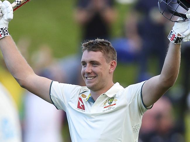 Cameron Green celebrates after reaching his hundred during the final over of the day in Wellington on Thursday. Picture: Hagen Hopkins/Getty Images.