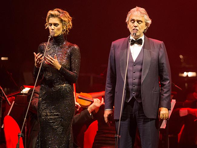 Delta Goodrem on stage with Andrea Bocelli. Picture: Duncan Barnes