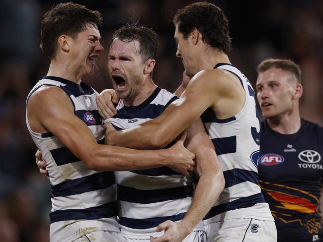 Patrick Dangerfield of the Cats celebrates a 4th quarter goal with Connor O’Sullivan and Shannon Neale. Picture: Michael Klein