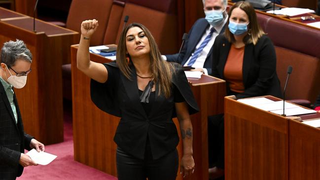 Greens senator Lidia Thorpe raises her arm in a black-power salute during her swearing-in ceremony at Parliament House in Canberra on Monday. Picture: AAP