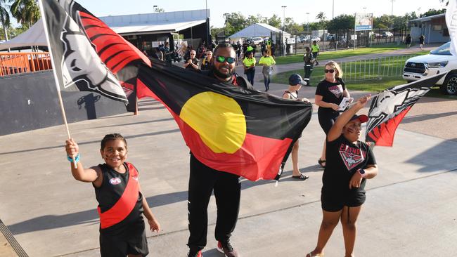 AFL Dreamtime Game Richmond V Essendon at Darwins TIO Stadium. Kenny Morton [with flag] Kendal Morton and Kenai Morton. Pictures Katrina Bridgeford.