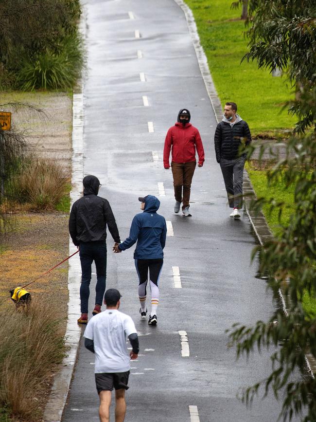 Melburnians get their exercise in South Yarra during Melbournes fifth Covid-19 lockdown. Picture: Mark Stewart