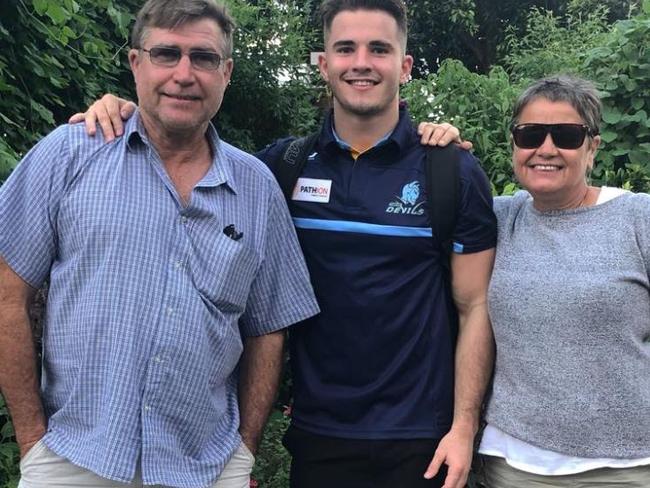 Calum Gahan with his parents Lawrie and Gill. Picture: Calum Gahan Facebook.