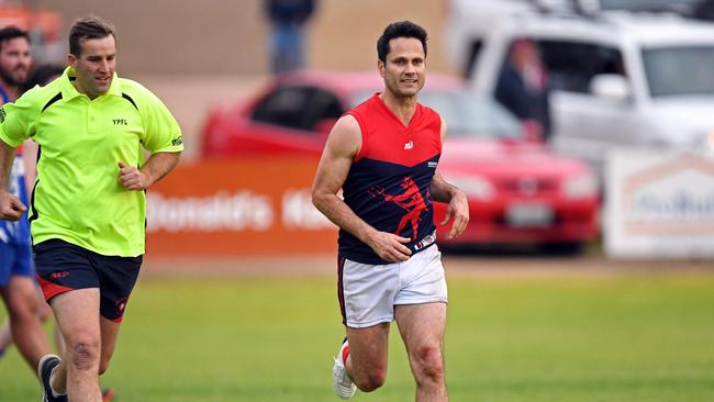 JOB WELL DONE: Wanganeen heads to the bench in the dying minutes of the game. Photo Tom Huntley