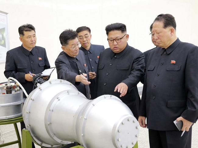 North Korean leader Kim Jong-un inspected the loading of a hydrogen bomb into a new intercontinental ballistic missile. Picture: Korean Central News Agency/Korea News Service via AP