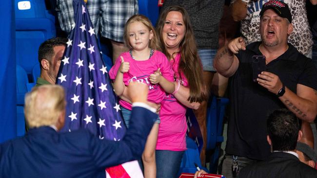 Donald Trump pumps his fist while thanking supporters at the rally. Picture: AFP