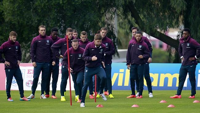 England players warm up during a training session in Vale do Lobo.