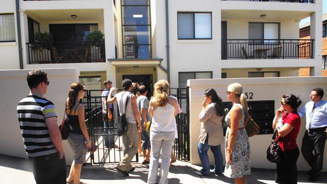 Rent crisis - about 25 people in rental market queue to inspect a one bedroom apartment in Clovelly. Chahaija Hunter inspects the home