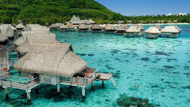 Overwater villas at Sofitel Kia Ora Moorea, French Polynesia.