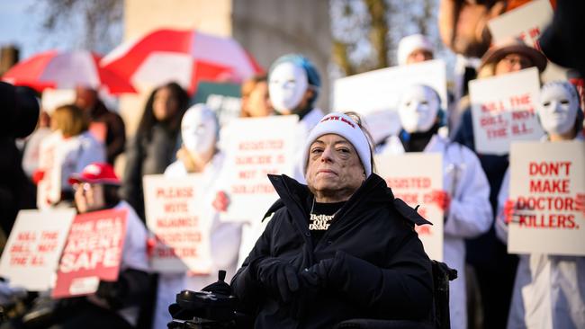 Campaigner and actress Liz Carr of the "Not Dead Yet" campaign, which opposed Britain’s Assisted Dying Bill, joins a protest outside the Houses of Parliament.