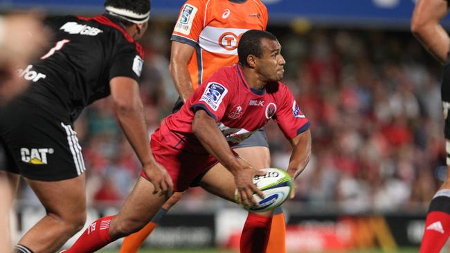 Will Genia shapes to pass for the Reds.