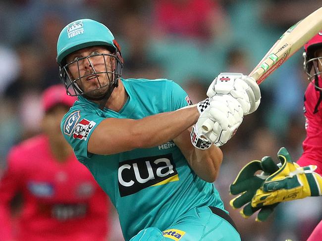 Heat's Chris Lynn smashes a six during the Big Bash match between the Sydney Sixers and Brisbane Heat at the SCG. Picture. Phil Hillyard