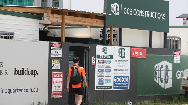 Workmen completing construction on Marine Quarter at Labrador for GCB Constructions. Picture: Glenn Hampson