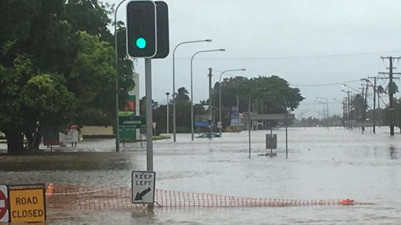 Man dies in south Queensland floods as more heavy rain expected in the region