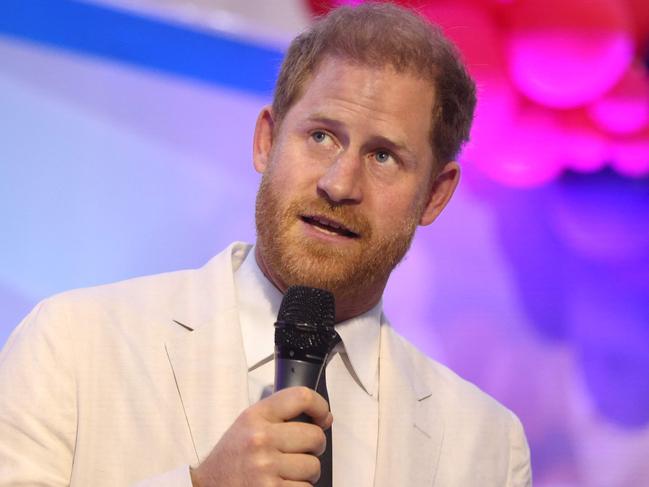 Britain's Prince Harry, Duke of Sussex, gives a speech as he attends a Sit Out with Britain's Meghan (unseen), Duchess of Sussex, at the Nigerian Defence Headquarters in Abuja on May 11, 2024 as they visit Nigeria as part of celebrations of Invictus Games anniversary. (Photo by Kola SULAIMON / AFP)