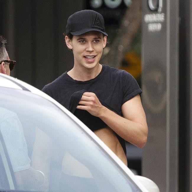 Actor Austin Butler, who is cast as Elvis Presley in Baz Luhrmann’s Elvis, walks near Peppers in Broadbeach on Tuesday. Picture: Nigel Hallett