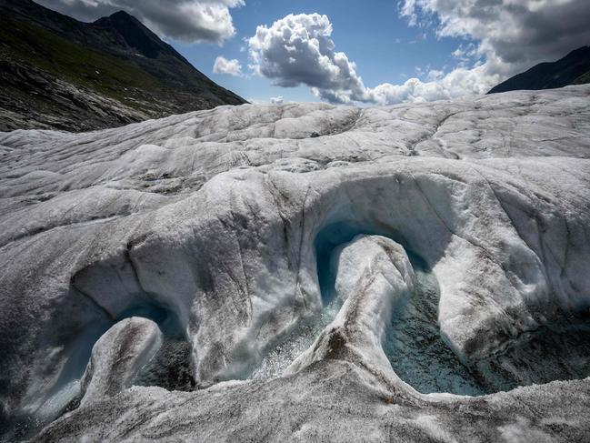 (FILES) This file photograph taken on August 25, 2021, shows a view of the Aletsch Glacier. - Swiss glaciers lost 1percent of their volume in 2021 despite abundant snow and a cool summer, due to climate change, the Swiss Academy of Natural Sciences revealed on October 19, 2021. (Photo by Fabrice COFFRINI / AFP)