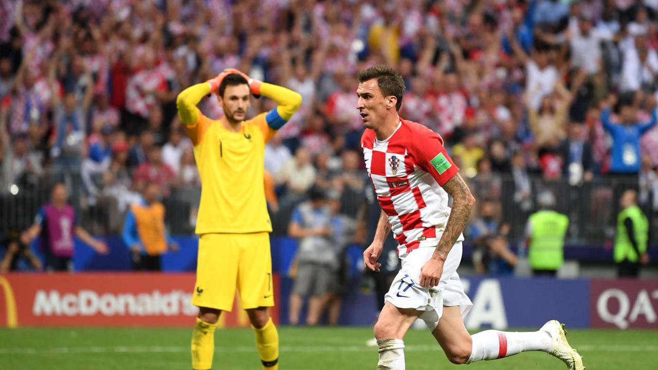 Hugo Lloris reacts after gifting Mario Mandzukic a goal.