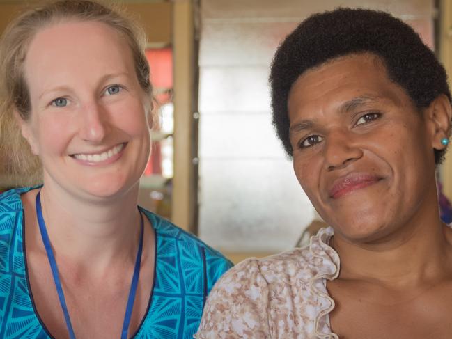 Dr Nicola Fitzgerald with a woman in Fiji.