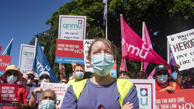 AMMU organiser Maddi Heathfield leads the protest outside the Regis Whitfield residential aged care facility. Picture: Brian Cassey.