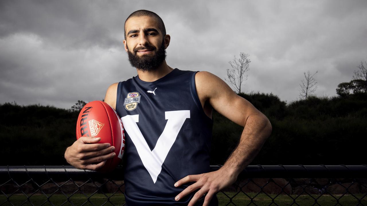 Adam Saad models the Big V jumper ahead of the bushfire relief game. Picture: Nicole Cleary