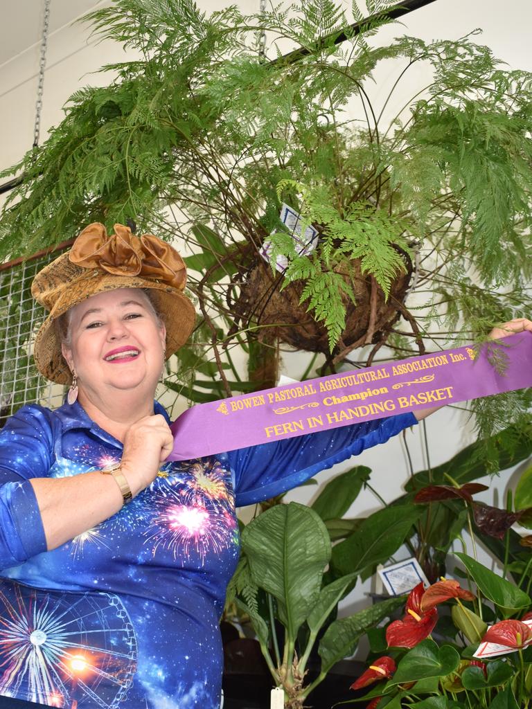 Fiona Radcliffe with her Champion Hanging Basket - a haresfoot fern she 'rescued' from her mother's garden. Picture: Kirra Grimes