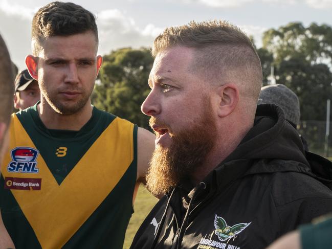 Endeavour Hills coach Matt Peake at the huddle on Saturday. Picture: Valeriu Campan