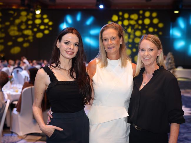 Sarah Staerk, Kara Roberts and Donna Long at the 2023 Christmas Appeal - Gold Coast Leaders Business Breakfast at The Star Gold Coast. Picture, Portia Large.