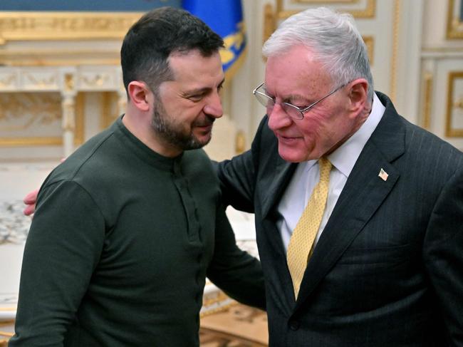 Ukraine's President Volodymyr Zelensky (L) greets US envoy Keith Kellogg at his offices in Kyiv. Picture: AFP